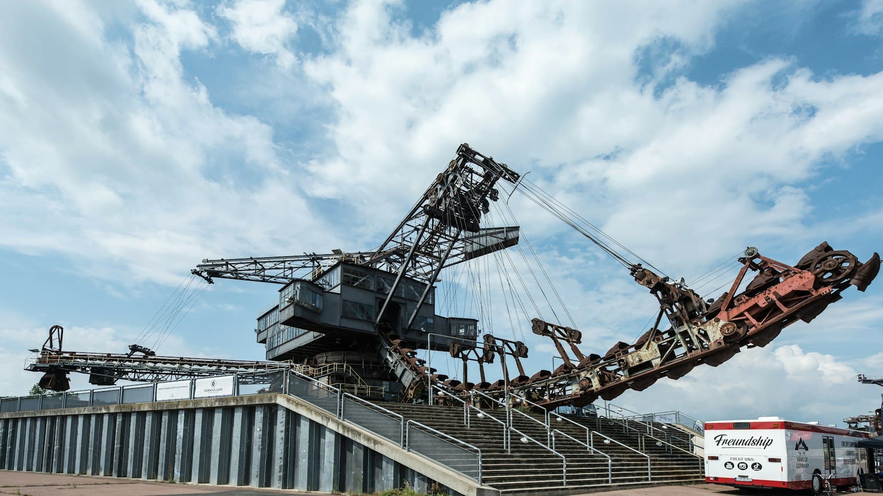Large excavator operating at an open pit mining site