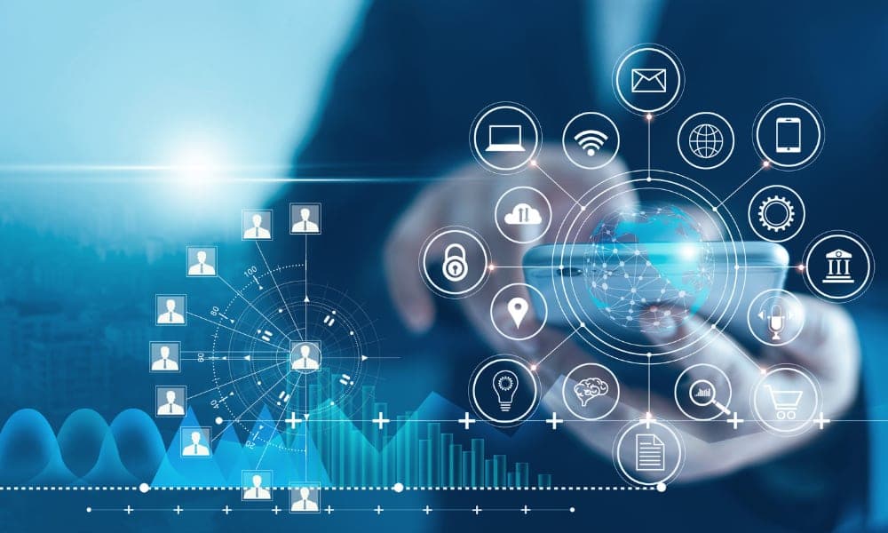 A hand holding a smartphone surrounded by connected technology and integration icons.
