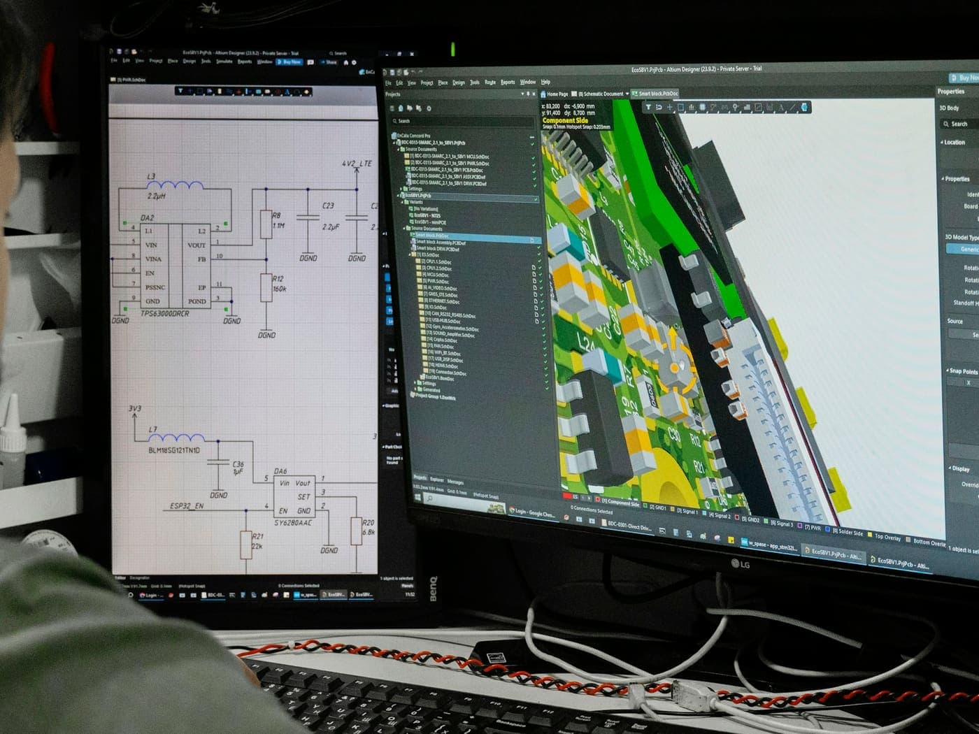 An engineering workstation with a control schematic on one screen and a three dimensional plant layout on the other